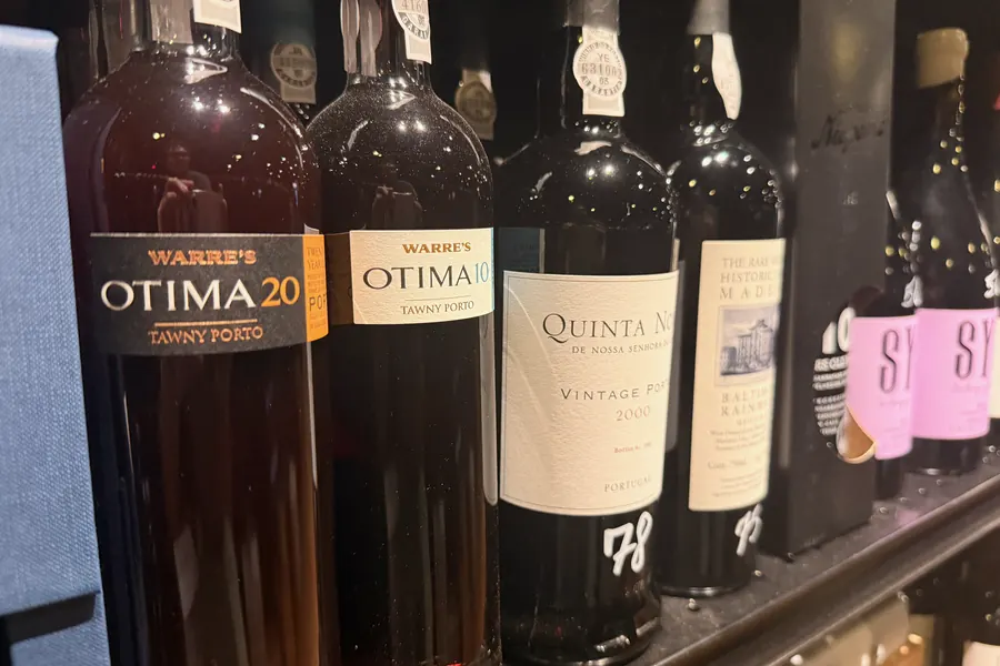 Port on La Vid’s shelf: Warre’s Otima 20 and Otima 10 Tawny Port among other ports with handwritten prices