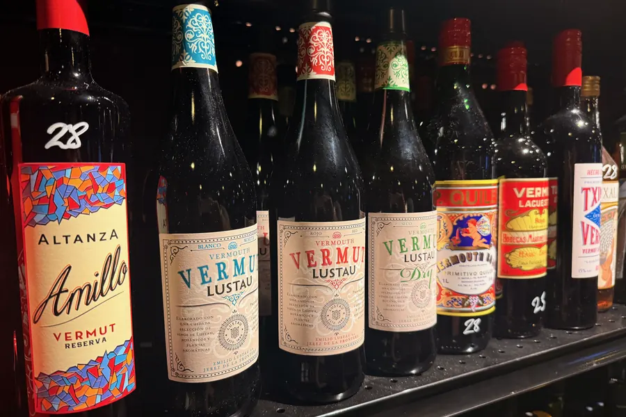 A row of Spanish vermut at La Vid: Altanza Amillo Reserva, Lustau Vermut, and others with handwritten prices