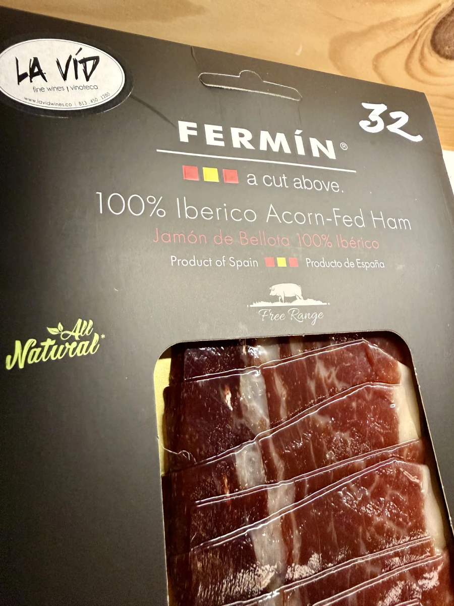 A pack of Fermín 100% ibérico acorn-fed ham, carved into thin slices