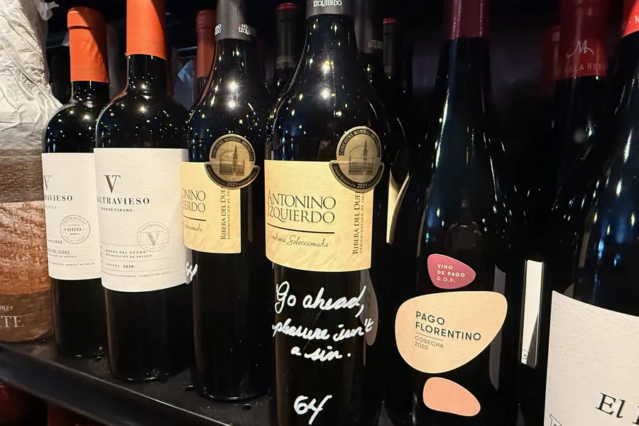 Antonino Izquierdo, Ribera del Duero, on La Vid’s shelf with Victor’s note in white marker: “Go ahead, pleasure isn’t a sin.”